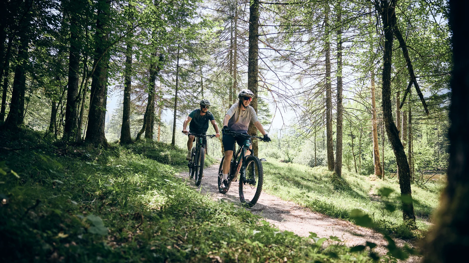 Destination development © Tobias Köhler Two people mountain biking on a forest trail